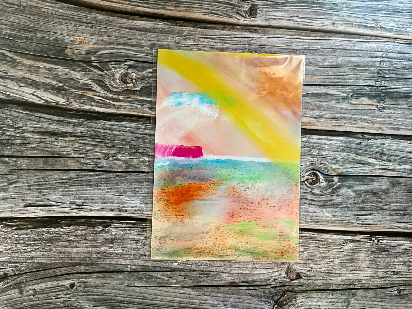 Colorful abstract painting on a wooden surface