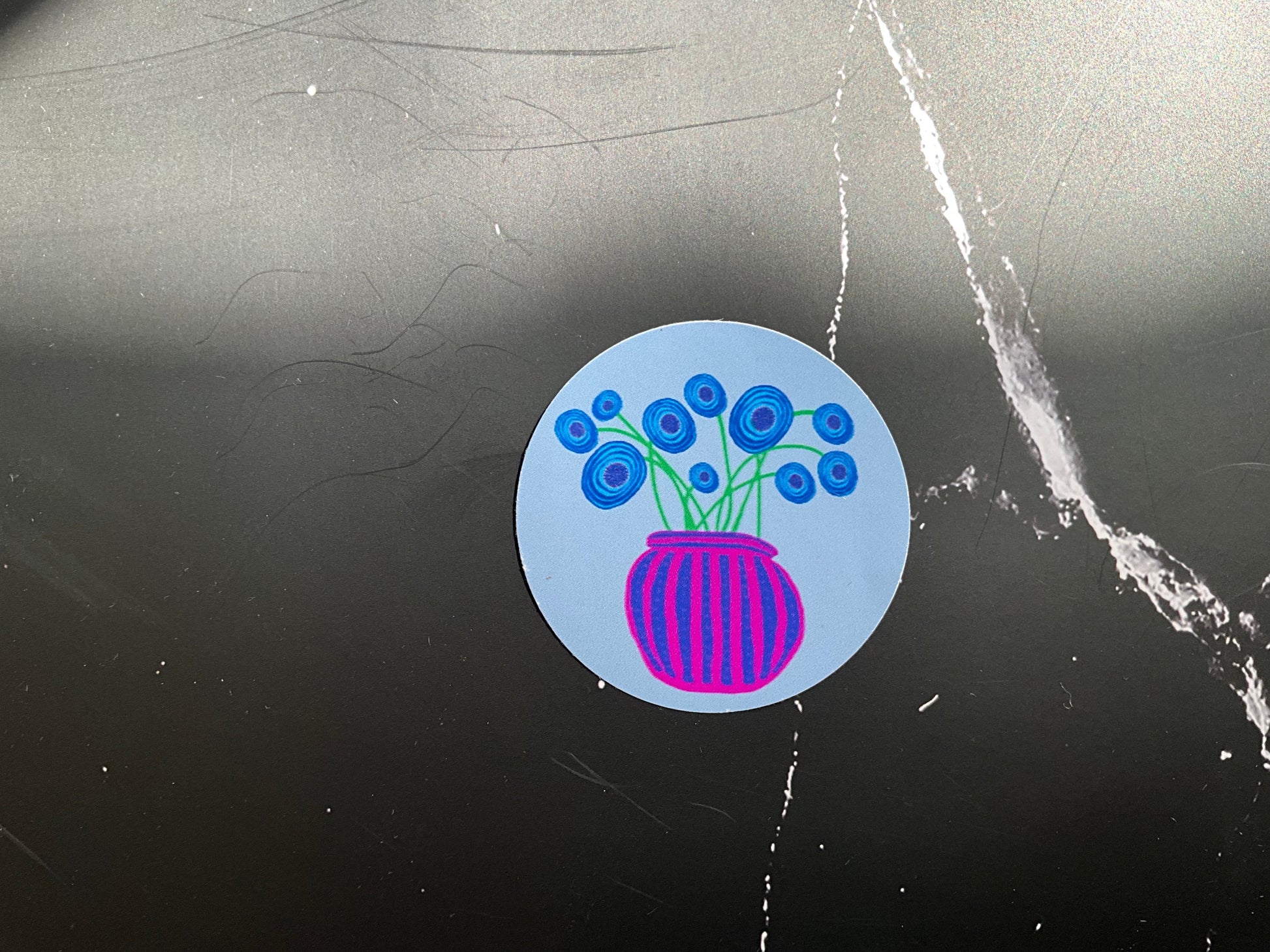 Blue sticker with a purple and blue striped vase with abstract blue poppy  flower illustrations