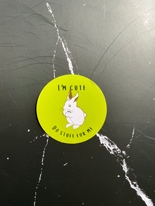 Lime green vinyl sticker featuring a white bunny and the text, I’m cute, do stuff for me. 