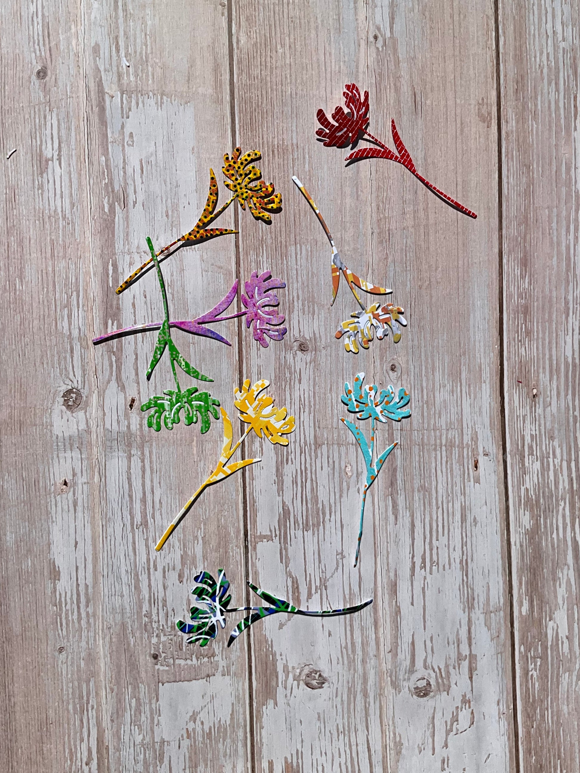 Colourful patterned dandelion shaped vinyl cut stickers
