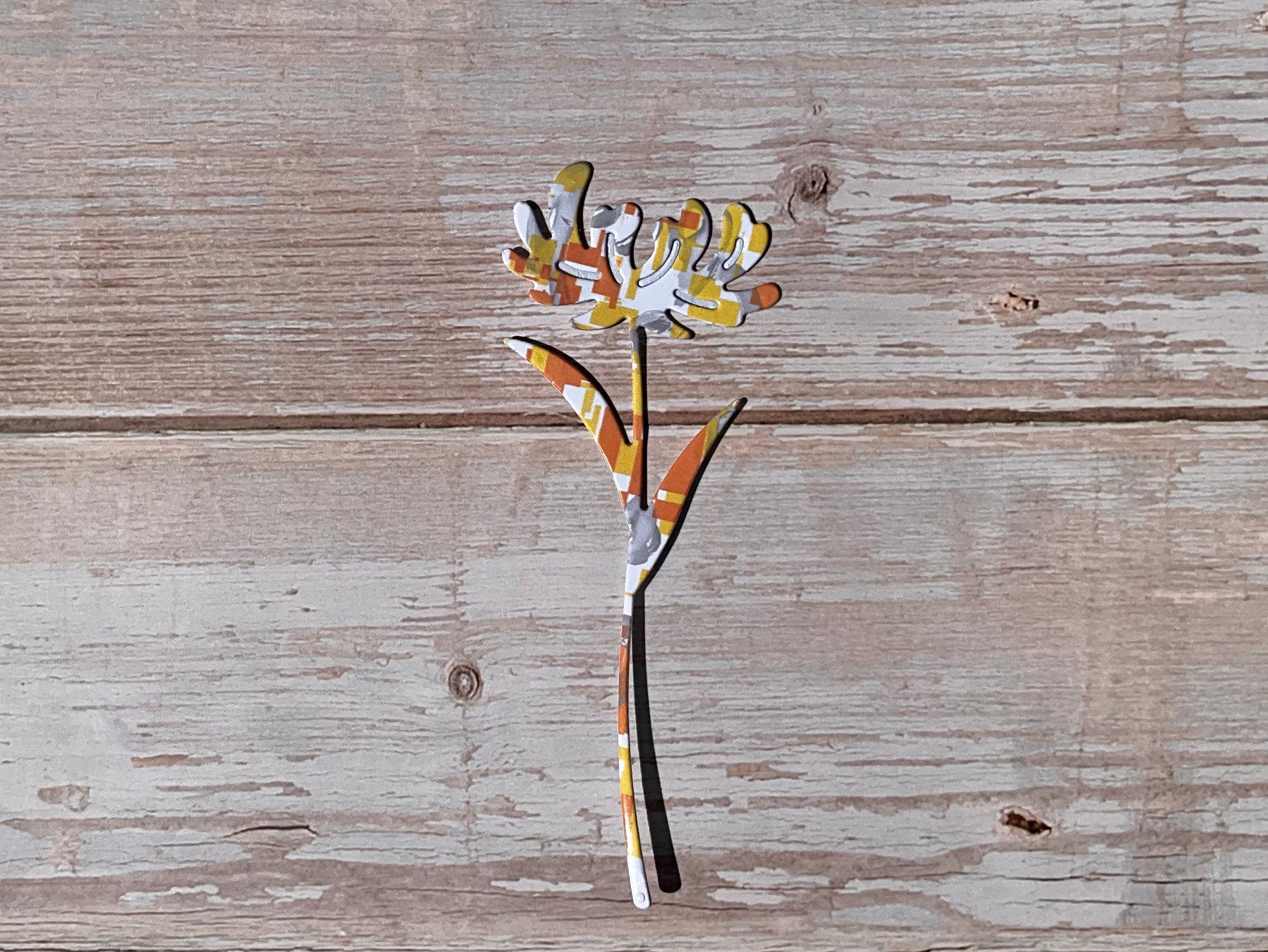 Grey, white, yellow and orange patterned floral vinyl sticker