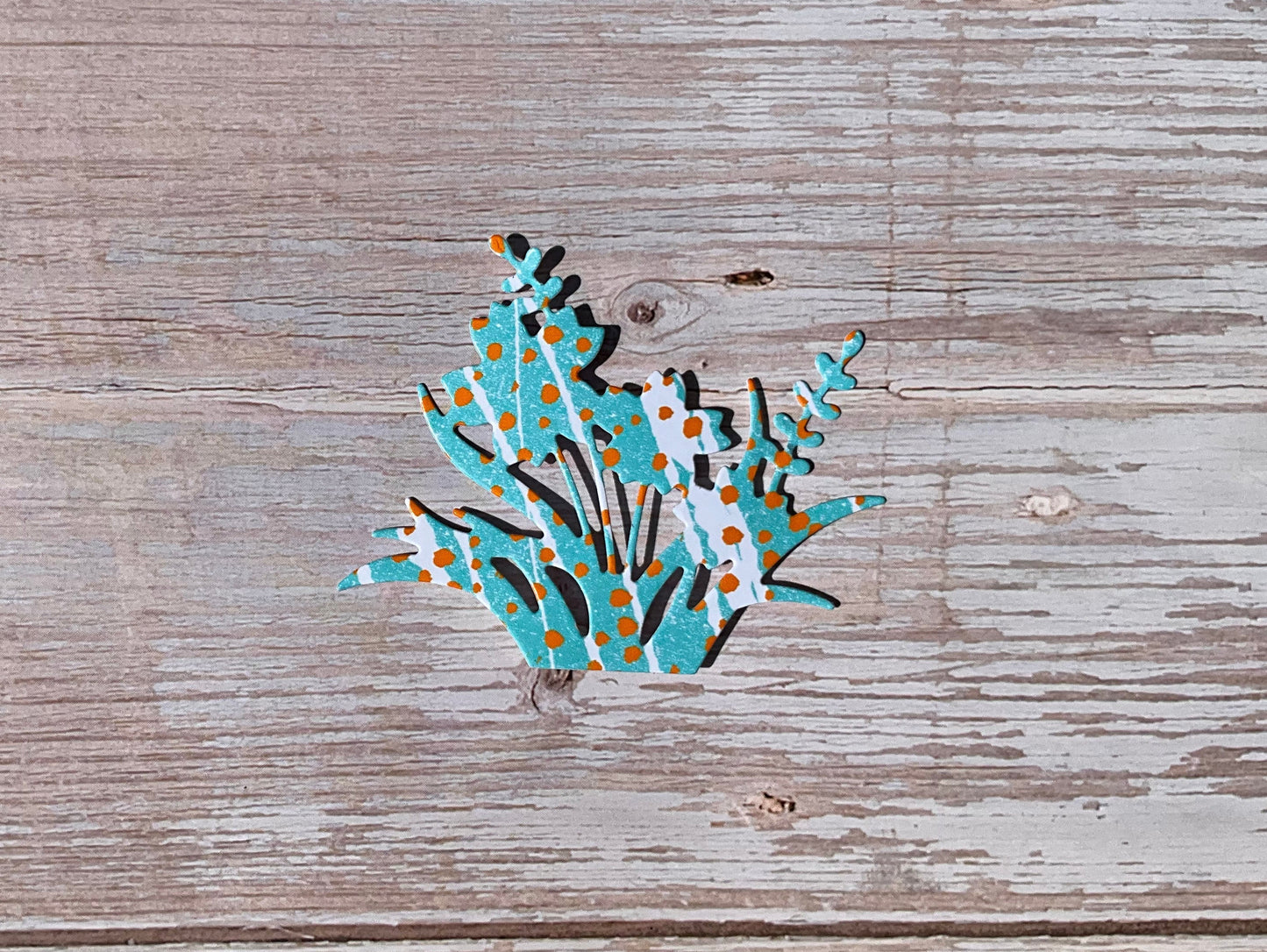 Turquoise and orange patterned vinyl flower sticker
