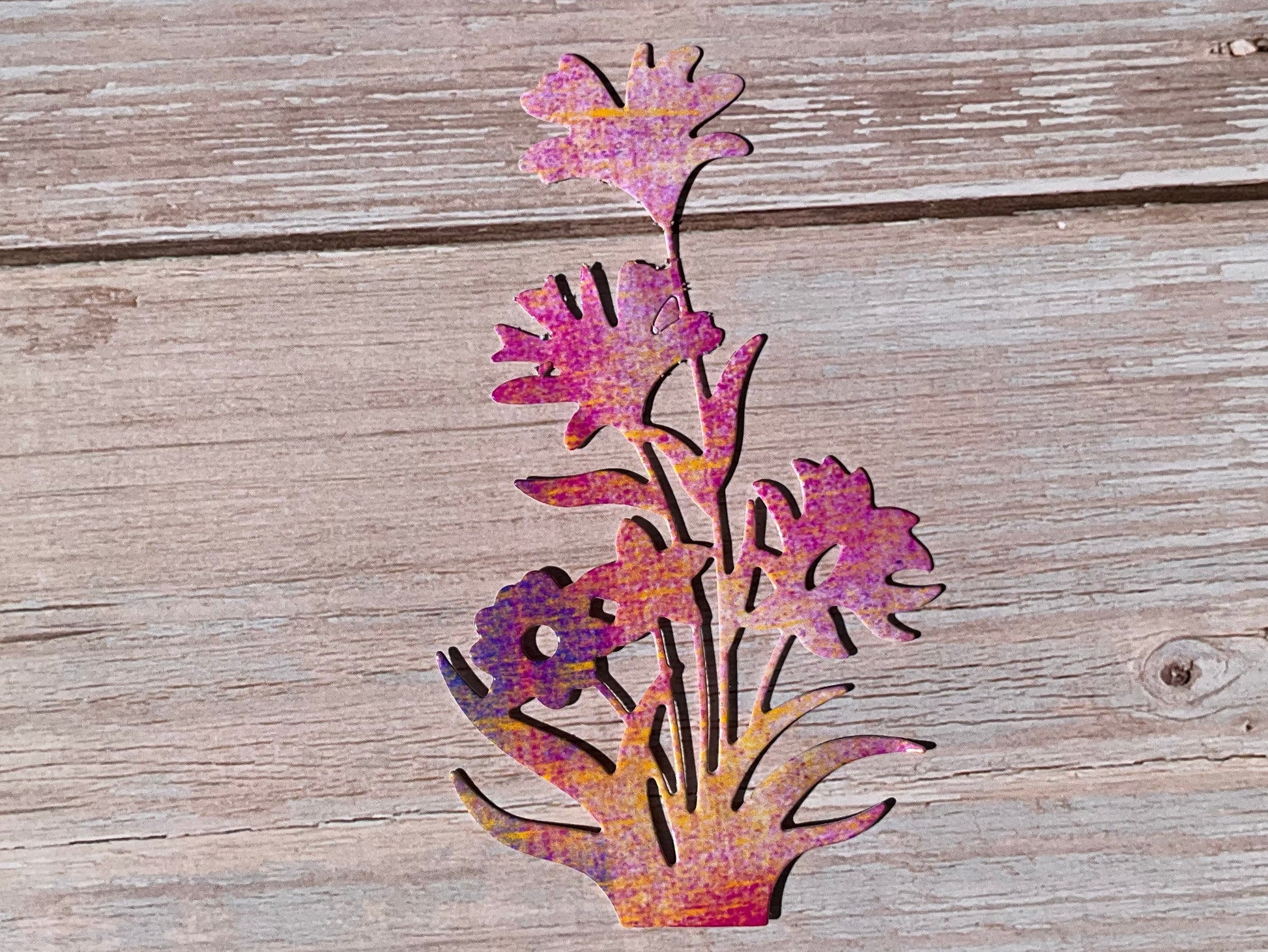 Pink and purple flowers - vinyl sticker on a wooden surface