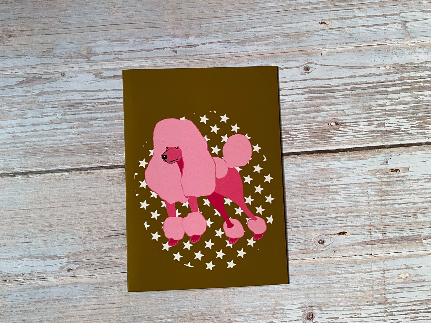 Poodle greetings card - hand illustrated poodle card with stars on a mustard yellow background. 