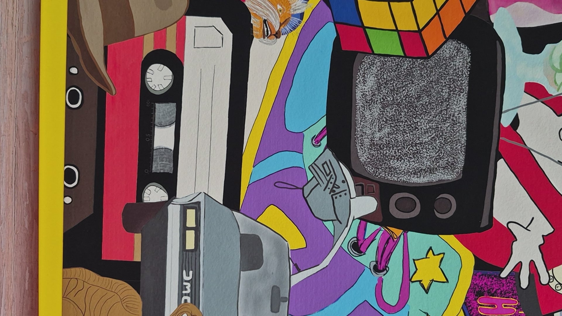 Video showing an 80s college print in a yellow frame