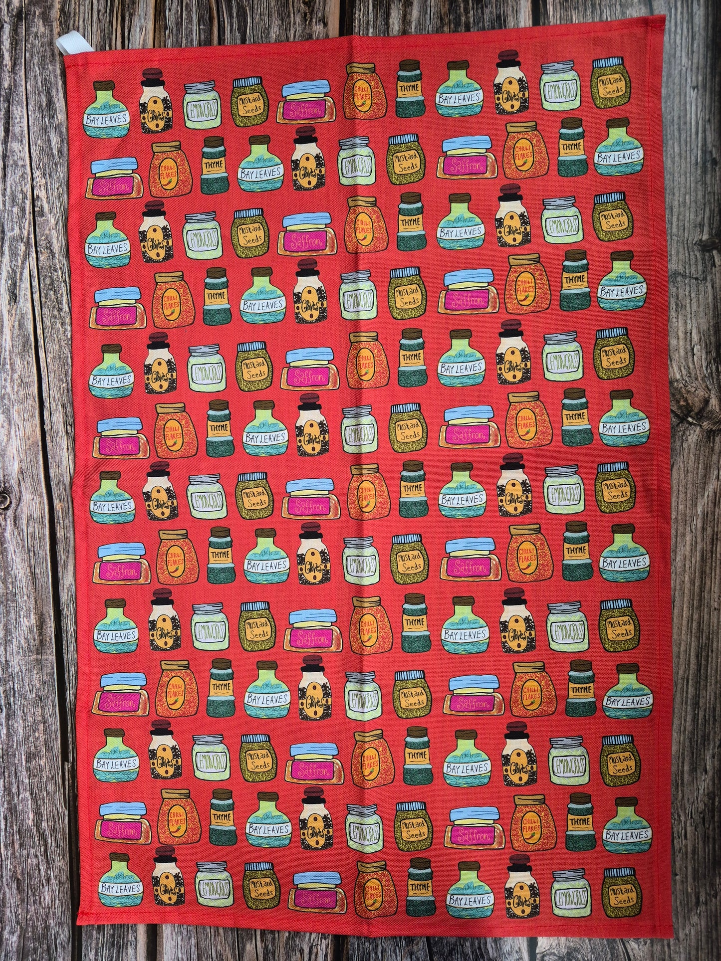 Red tea towel with spices print 
