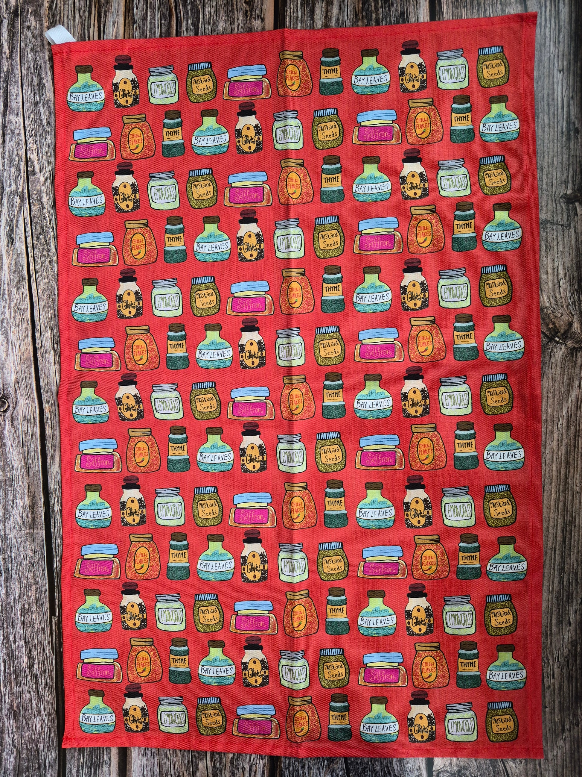 Red tea towel with spices print 
